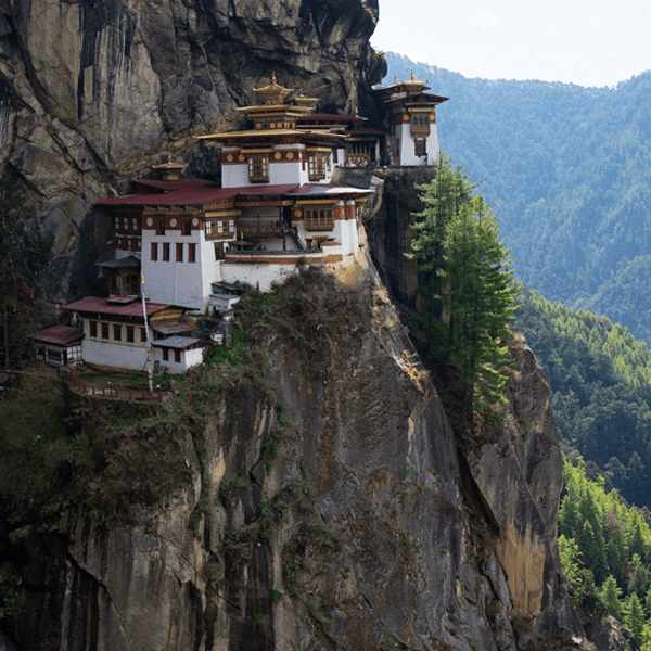 Tiger's Nest Monastery, hidden in mountain cliffs, on this Bhutan Yoga Retreat with The Travel Yogi