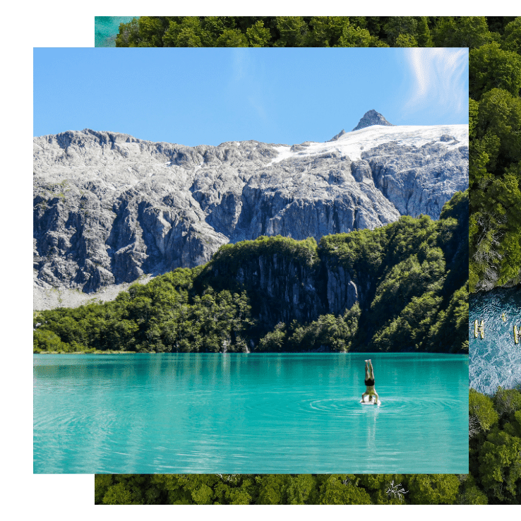 A person rafts on a teal green glacial lake amidst mountains on the Patagonia yoga retreat with The Travel Yogi.