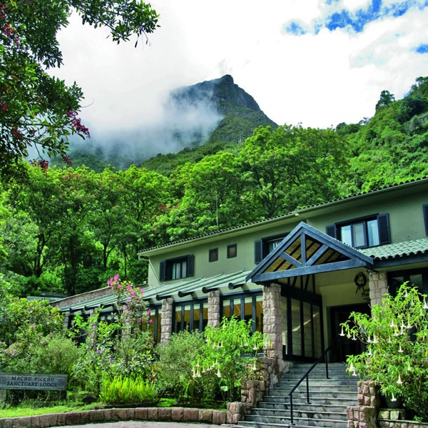Accommodations adorned with lush greenery. Explore this Peru yoga retreat with The Travel Yogi
