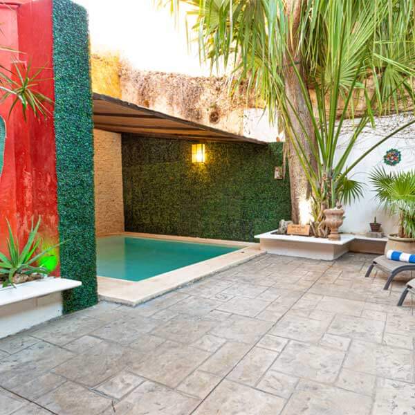 Dip in the pool in your central Merida accommodations on your Mexico yoga adventure