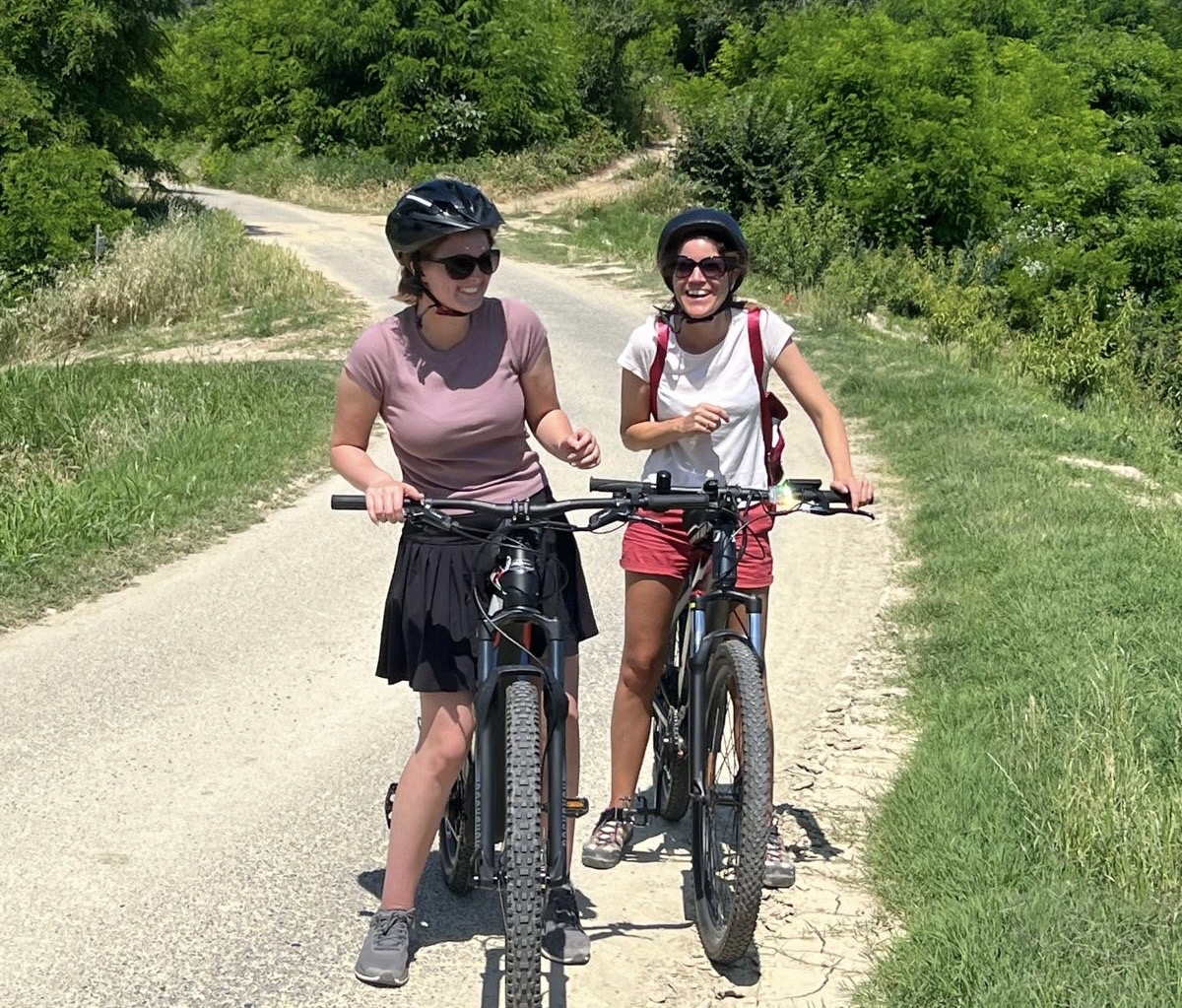 Evie and Laura e-biking in Italy via Dropbox.