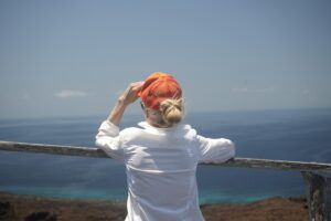 Traveler looking out over the ocean in the Galapagos via Dropbox.