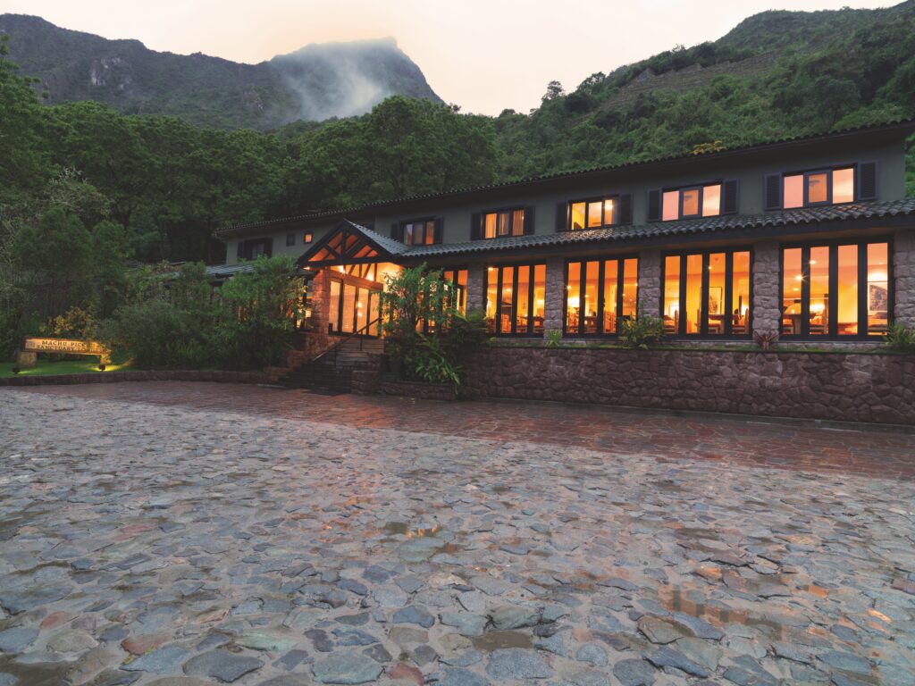 The entrance to the Belmond Santuary Lodge on Machu Picchu in Peru at sundown.