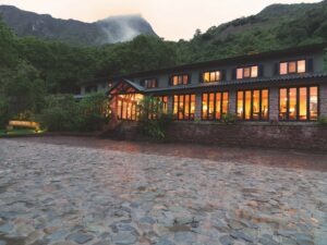 The entrance to the Belmond Santuary Lodge on Machu Picchu in Peru at sundown.