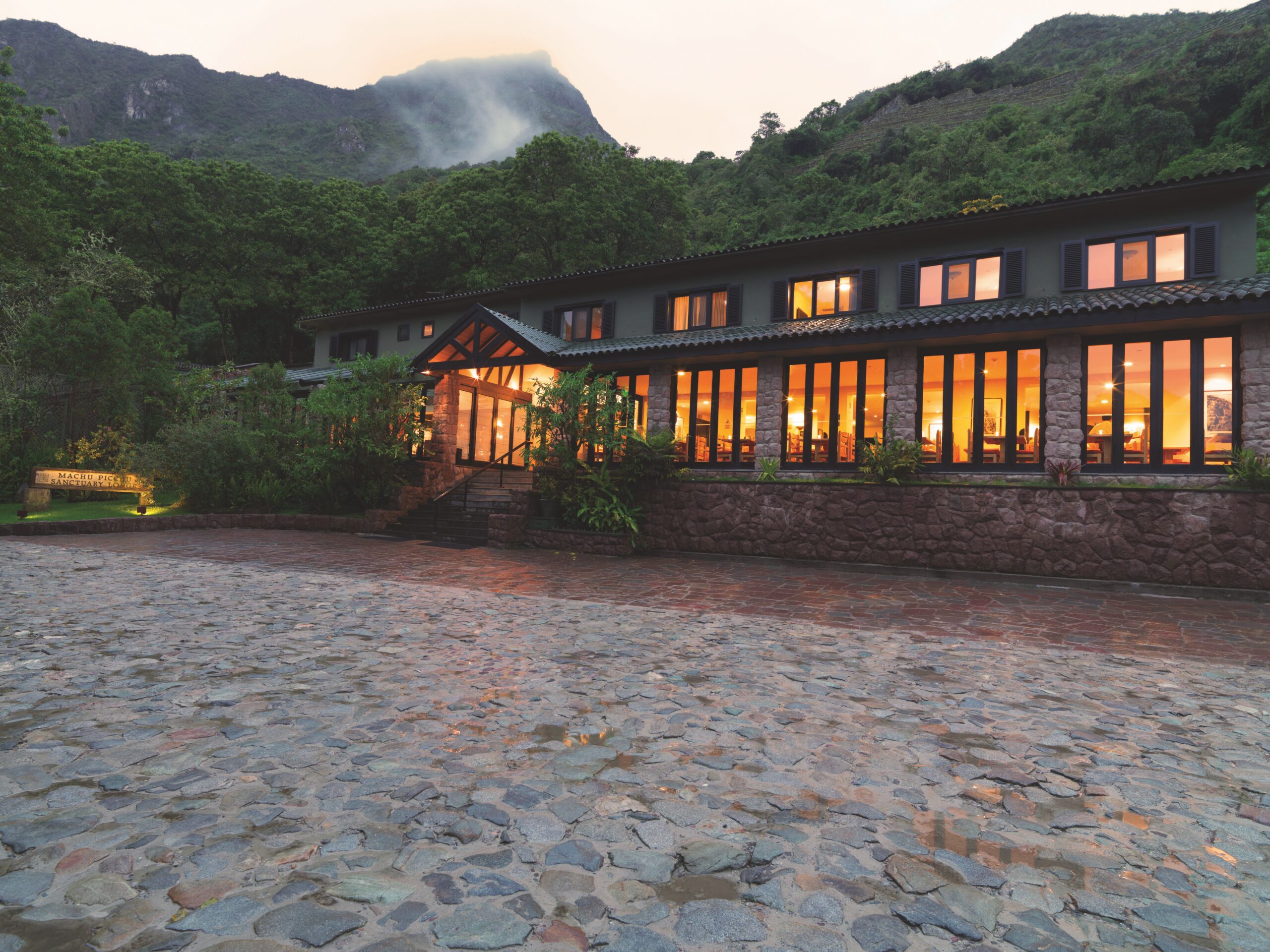 The entrance to the Belmond Santuary Lodge on Machu Picchu in Peru at sundown.
