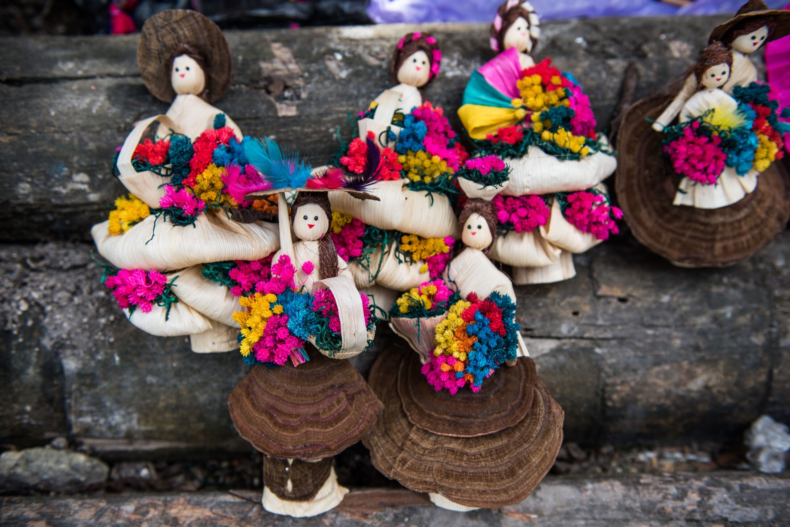 Corn husk dolls made by women in Uaxactun, Guatemala